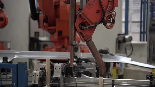 Robot Arm Welding Close Up 4K alt