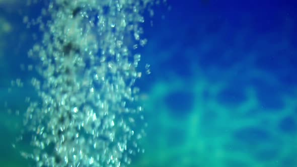 Bubbles Oxygen Moving Line Closeup Background Blue Ocean Water Slowmotion alt