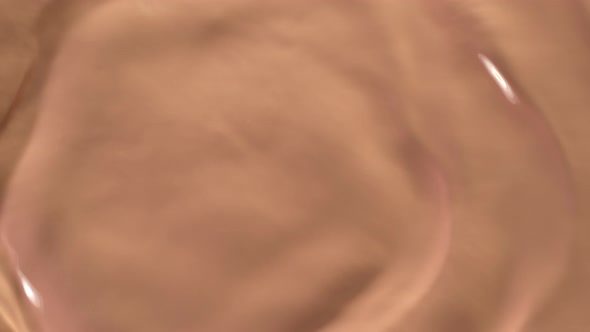 Super Slow Motion Shot of Rippling Makeup Cream at 1000Fps. alt