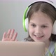 School Girl Pupil During Video Call Online Via Internet on Laptop with Headphones - VideoHive Item for Sale