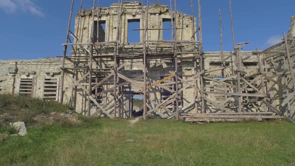 Scaffolding at Skala-Podilsky Castle alt