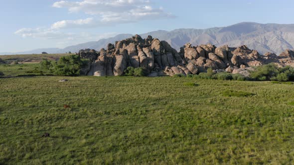 Aerial of Stones at the Green Meadow, USA. Scenic Nature Landscape at Sunset alt