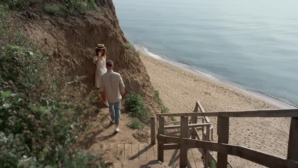 Lovely Pair Rest Beach Sunny Day alt