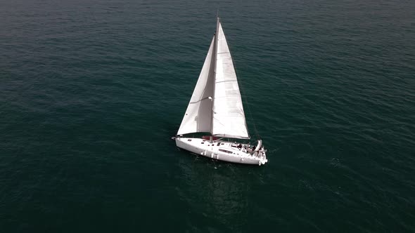Amazing Aerial Shot of a Sail Boat Sailing in Wind