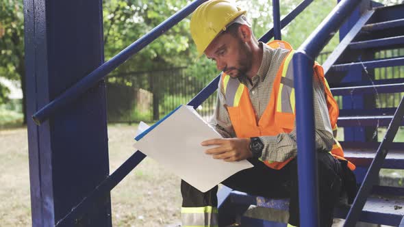 Confused Building Supervisor Or Architect Taking Notes alt