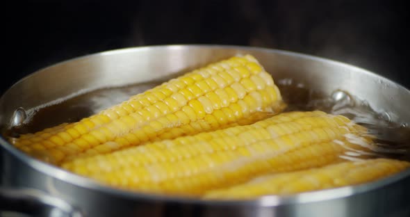 Corn Is Boiling with Air Bubbles in the Pan. 