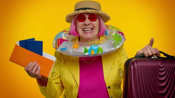 Traveler Tourist Senior Woman Granny Celebrating Holding Passport Tickets Luggage Summer Vacation alt