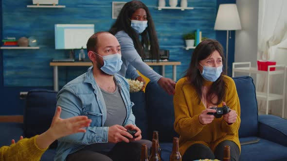 Excited Group of Multiethnic Friends Celebrating Victory alt