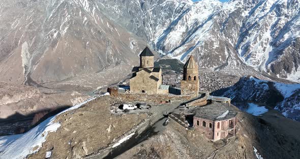 Aerial view of Gergeti Trinity Church, Tsminda Sameba in Kazbegi. Georgia 2022 alt