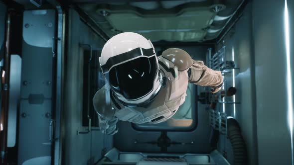 Astronaut Hovers Inside His Spaceship
