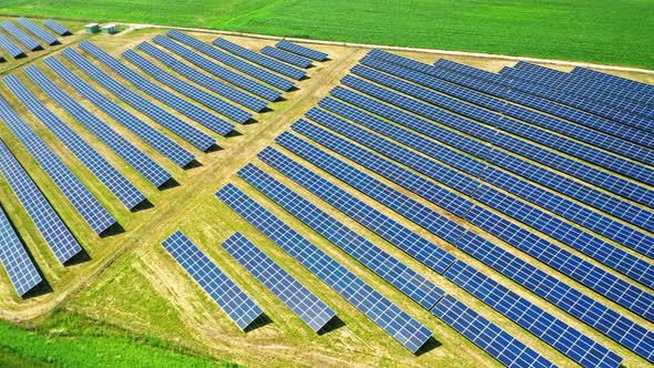 Aerial view of solar panels on field in Poland alt