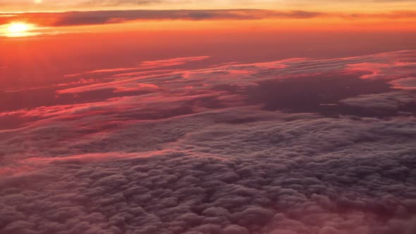 Flight Above Pink Clouds During Sunset