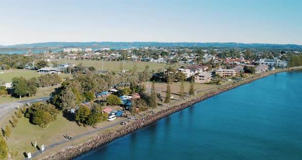 Aerial Flying Over Looking Directly Down On Road Outside Town