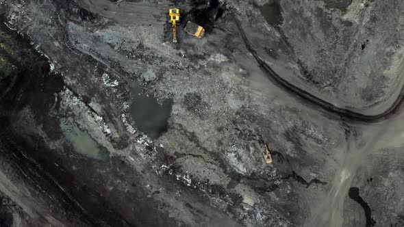 Aerial/Drone view open mine pit coal mining activity