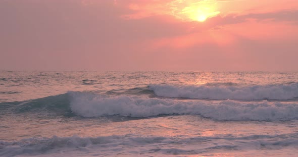 Surfer Silhouette Swaying on Pink Waves at Sunset alt