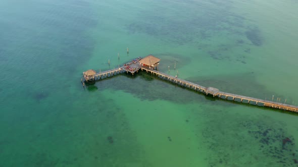 Wooden Beach Bar in Sea and Hut on Pier in Koh Mak Island Trat Thailand alt