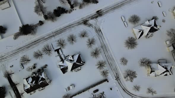 Blizzard Covers Roofs and Asphalt Roads Leading Through Tranquil Suburbs the Snow Covered Streets alt
