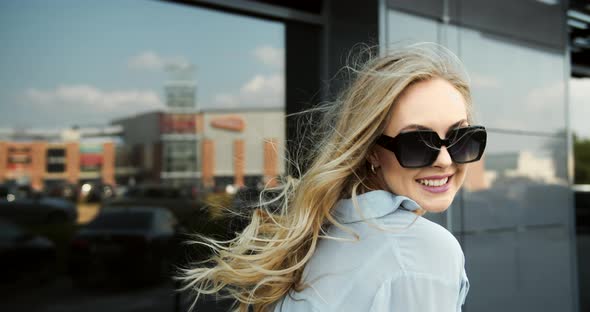 Happy Woman with Shopping Bags