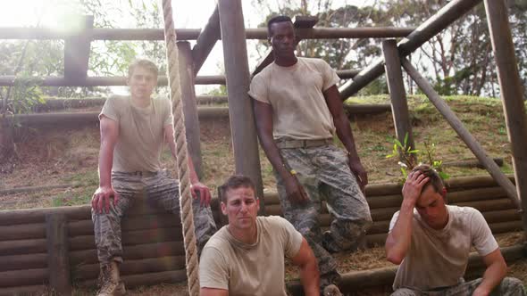 Military soldiers relaxing during obstacle course 4k alt