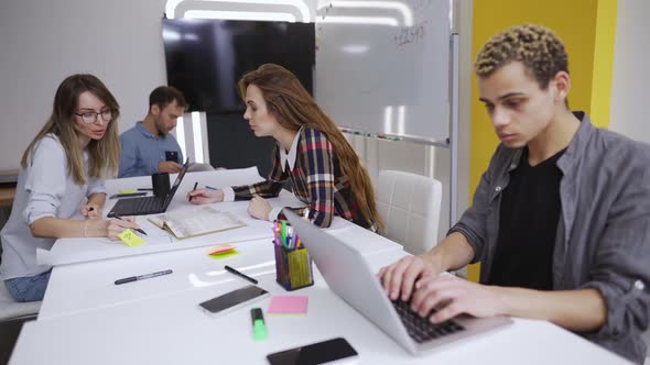 Young Creative Business People Communication Work with Laptops in the Office alt
