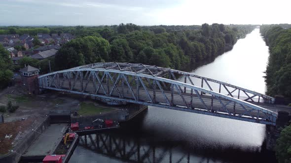 Aerial view Manchester ship canal swing bridge reflections traffic Warrington England alt
