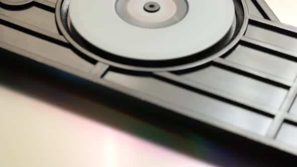 Compact disc reading mechanism fast rotating 4K 2160p UltraHD footage - DVD and CD player mechanism  alt