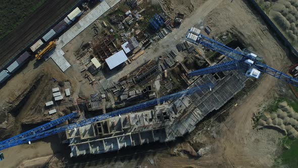 The View From the Air Construction Site Crane Construction of the Building alt