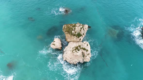 Huge Rock in a Blue Ocean Sea with Turquoise Water and Beautiful Beach alt