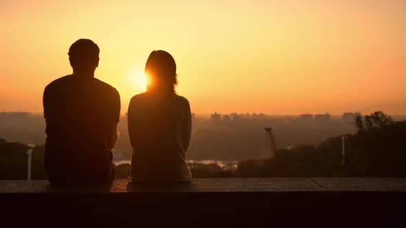 Couple Observing the Sundown