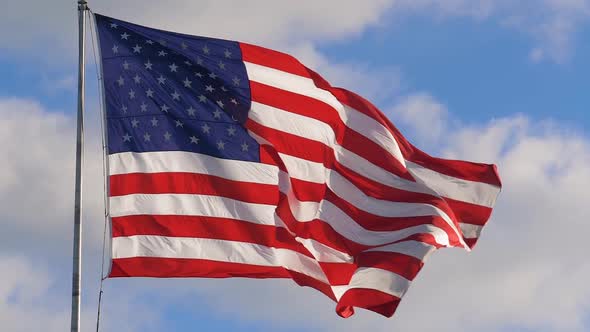 American USA Flag on Flagpole Waving, Slow Motion