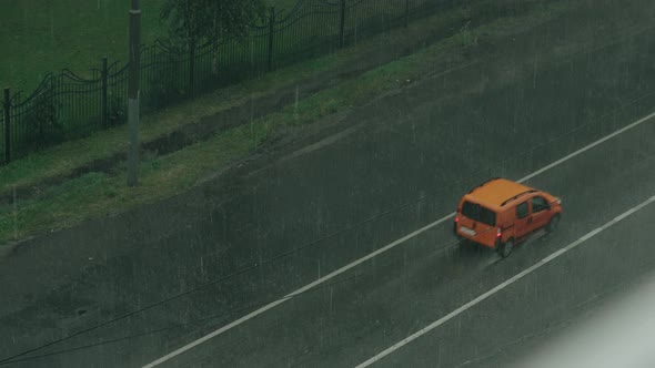 Cars Move on the Road with Strong Streams of Water
