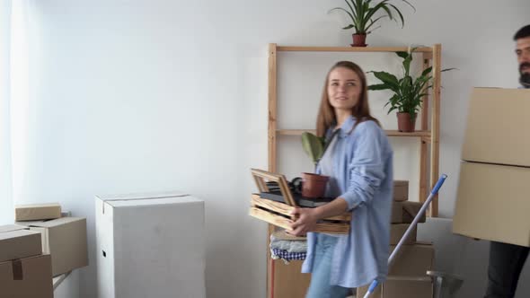 Moving to a New Apartment of a Young Couple in Love Relocation to a New House Homeowners Moved in alt