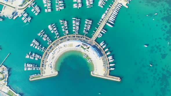 View from above of boats at docks of modern Sukosan marine, Croatia alt