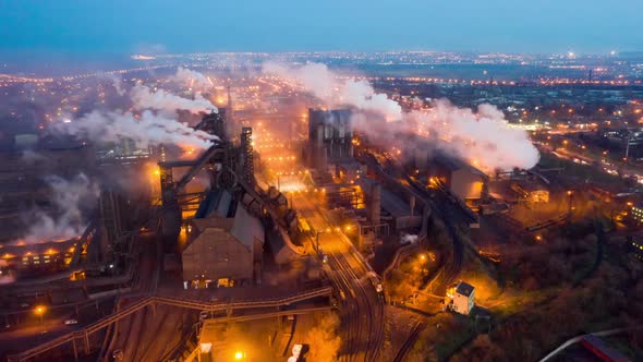 Aerial View. Emission To Atmosphere From Industrial Pipes. Smokestack Pipes Shooted with Drone alt