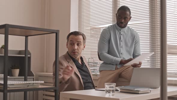 Multiethnic Coworkers in Office alt