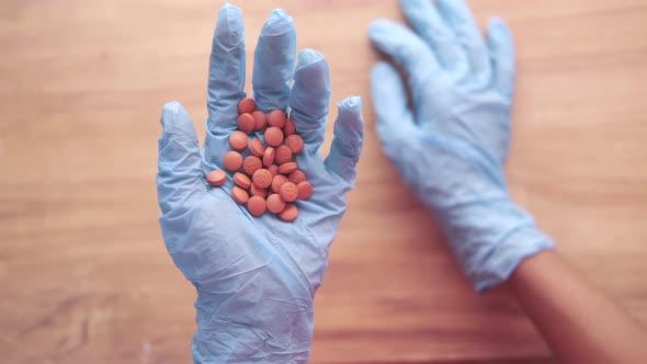 Fever or Pain Relief Medical Pill on Hand alt