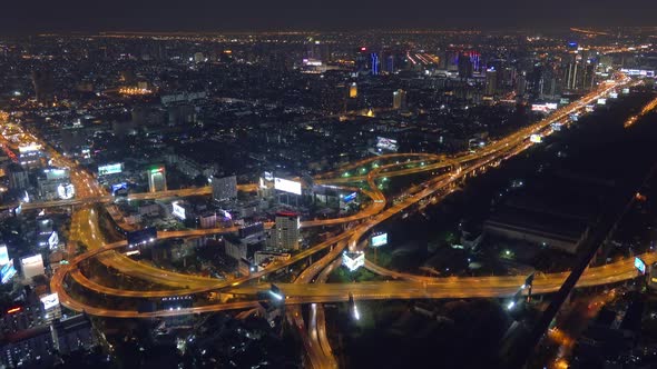 Aerial View on Illuminated Bangkok City at Night alt