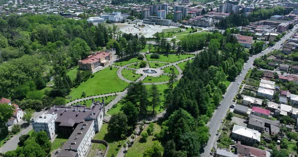 Zugdidi, Georgia - May 30 2022: Aerial view of Dadiani Palace in the center of Zugdidi city alt