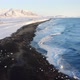 Arctic Icy Winter Scenery Aerial View of Black Snowy Coast - VideoHive Item for Sale
