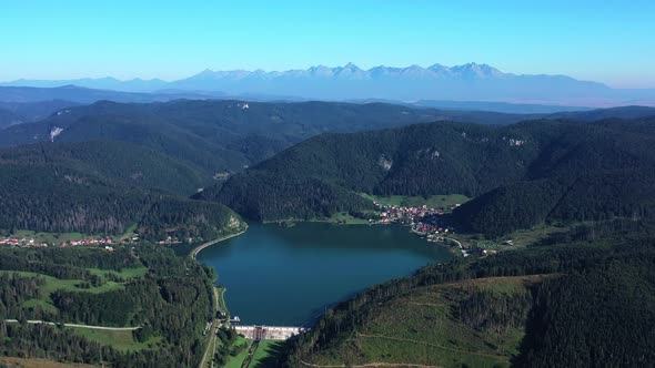 Aerial view of the Palcmanska Masa reservoir in the village of Dedinky in Slovakia alt