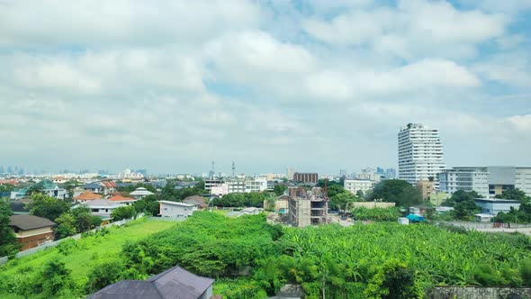 Time lapse Condominium construction project on green area of Bangkok city