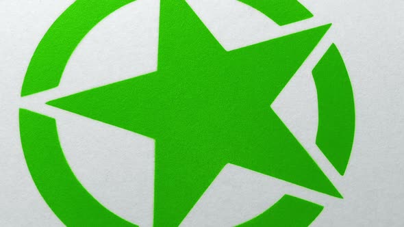 Green Star Graphic Spray Painted Onto Surface alt