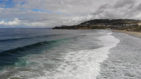 Low Aerial Glide Over Surfers At The Beach 4 K