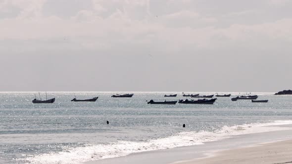 Fishing boat moored on the ocean, sea at the end of the day. Peaceful tranquility fisherman atmosphe