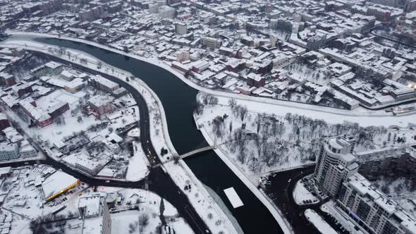 Skver Strilka park on winter river in Kharkiv city