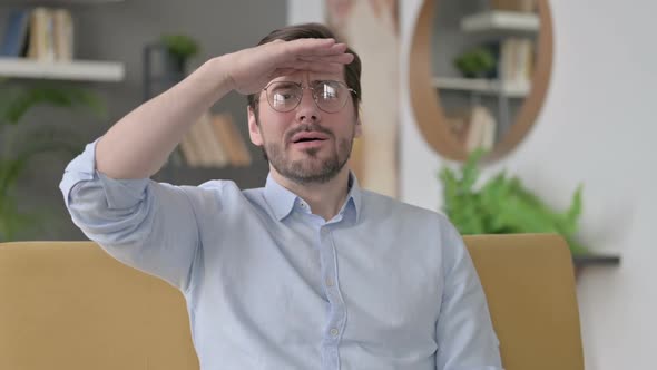 Portrait of Young Man Looking Around Searching alt