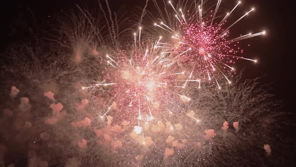 Colorful firework flashes at night