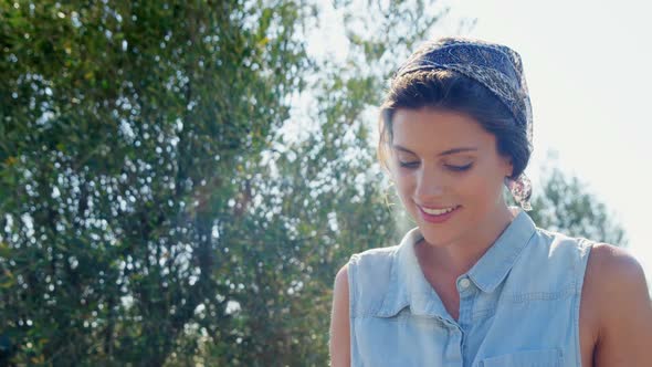 Smiling farmer in olive farm on a sunny day 4k alt