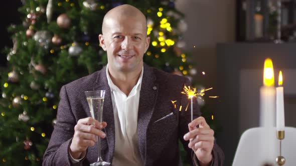 Handsome Caucasian Man Posing for Photos at New Year Party alt