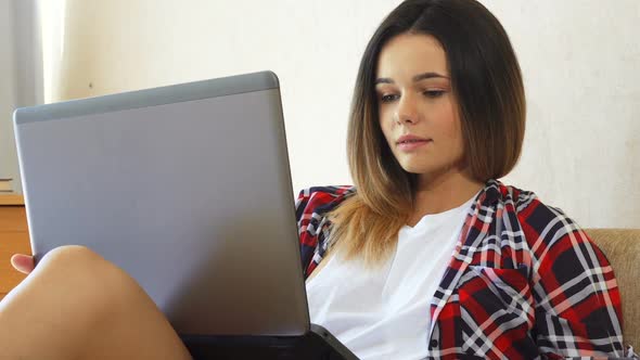 The Girl Is Having a Video Conversation alt